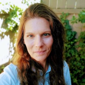 Hannah Johnson, LMT providing therapeutic massage at Siskiyou Massage in Ashland, Oregon.